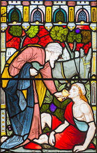 Stained glass of the Good Samaritan by Joseph Bell of Bristol.